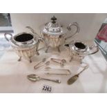 A 3 piece silver plate tea set (made in Sheffield), sugar nips etc.