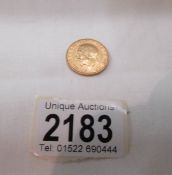 A 1911 gold Sovereign,.