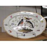 A Meissen meat platter decorated with birds.