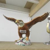 A Beswick Bald Eagle figure (slight A/F)