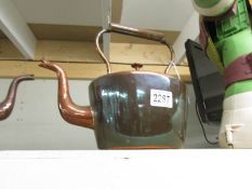 A Victorian oval copper kettle.