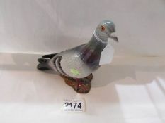 A Beswick Pigeon in good condition.