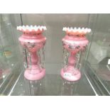 A pair of Victorian pink glass lustres.