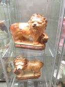 A large pair of Staffordshire lions.