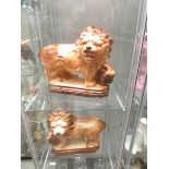 A large pair of Staffordshire lions.