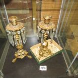 A pair of Victorian Rococo style candlesticks with glass droppers, a/f.