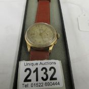 A fine 'dogma Prima' automatic wrist watch with an 18ct gold back plate and calf strap,
