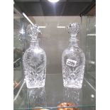 A pair of superb quality cut glass decanters.