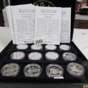 18 cased mint silver £5 coins 'Victoria Cross Winners'.