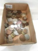 A mixed lot of UK coins etc., including George III cartwheel penny and pre 1947 silver.