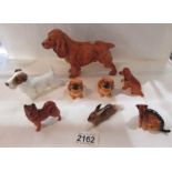 8 Royal Doulton dogs being a spaniel, a terrier and 6 smaller dogs.