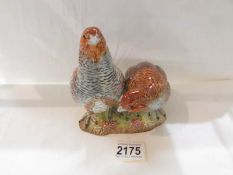 A Beswick Partridge pair, No.2064, in good condition.