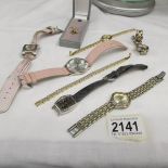 A mixed lot of wrist watches.