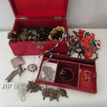 A jewellery box and contents.