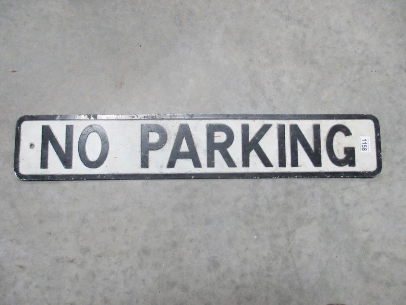 A vintage pressed aluminium No Parking road sign