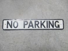 A vintage pressed aluminium No Parking road sign