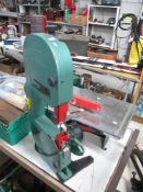 A Ferm FLZ-275 wood cutting band saw and a good working tile cutter