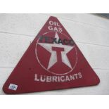 A triangular Texaco oil, gas, lubricants metal sign.