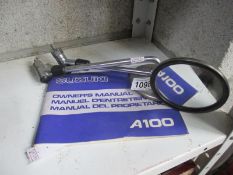 A pair of Suzuki A100 mirrors and owner's manual