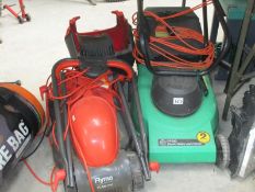 A Flymo "Rollermo" and a Performance power electric rotary lawnmower.