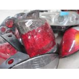 A huge lot of Ford/Vauxhall etc., front headlamp and rear lamp assemblies.