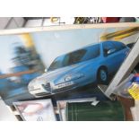 A collection of Alfa Romeo pictures consisting of large car saleroom display photo,