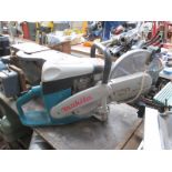 A petrol, water cooled Makita DPC 6410 disc cutter