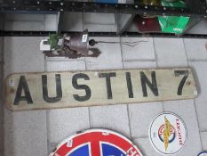 A painted wooden Austin 7 sign (approximately 112 x 20cm)