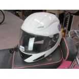 Four good full face motorcycle helmets 3 large and 1 medium including Roof Star