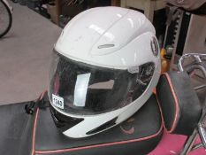 Four good full face motorcycle helmets 3 large and 1 medium including Roof Star