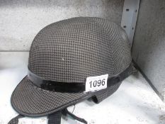 A vintage Everoak Deerstalker crash helmet