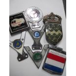 A quantity of vintage car badges including Fire service personnel etc