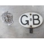 An AA GB car plaque and AA badge