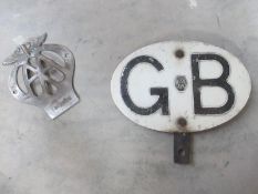 An AA GB car plaque and AA badge
