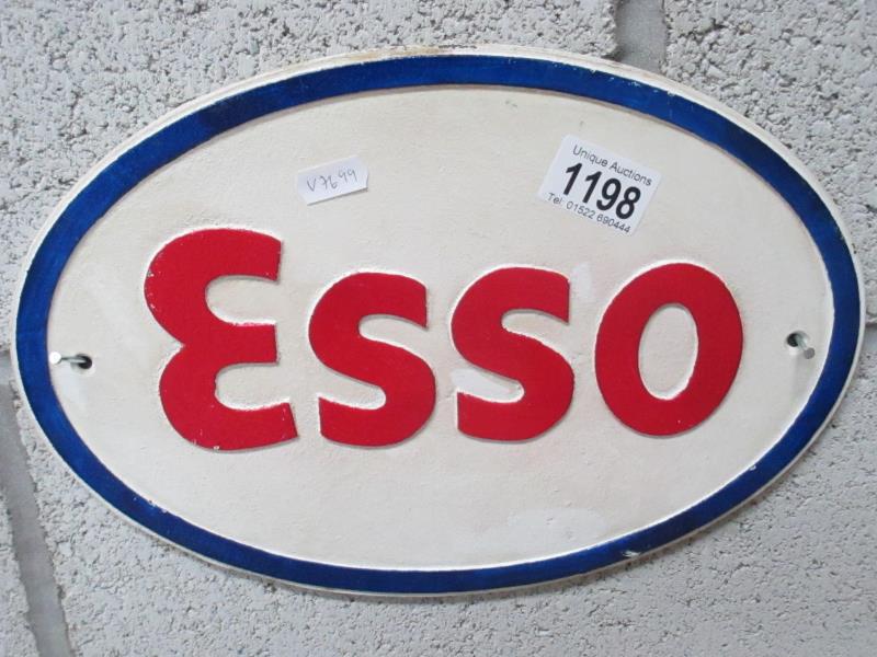 A cast iron ESSO wall plaque