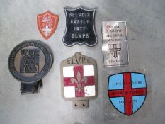 A quantity of Lincolnshire related car badges and rally plaques