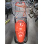 A Flymo easi glide 300v lawn mower.