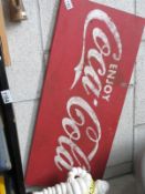 A Coca Cola painted metal sign (approximately 90 x 41cm)