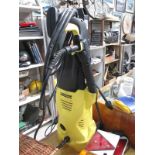 A Karcher K2 pressure washer with wand