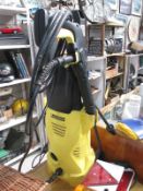 A Karcher K2 pressure washer with wand