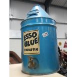 A large Esso Blue parafint tin with screw lid and brass tap.