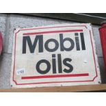 A painted metal Mobil Oils sign (approximately 40 x 30cm)