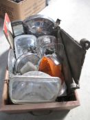 A mixed lot of car items including lamps, hubs, reflectors,
