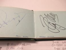 An autograph album containing an assortment of signatures principally from motorcycle racing