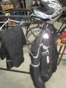 A large full face motorcycle helmet and a 2 piece crane Armour suit XL