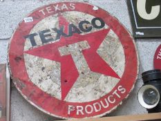 A round Texaco Texas Products advertising metal sign (approximately 60cm diameter)
