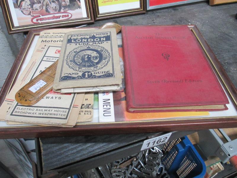 A mixed lot of motoring ephemera including maps, enamel badges, Austin Seven books,