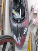 A MAX RPM "Dagger" fibre glass canoe with oars.