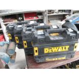 4 empty DeWalt tool cases