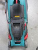 A Bosch electric lawn mower with grass box.